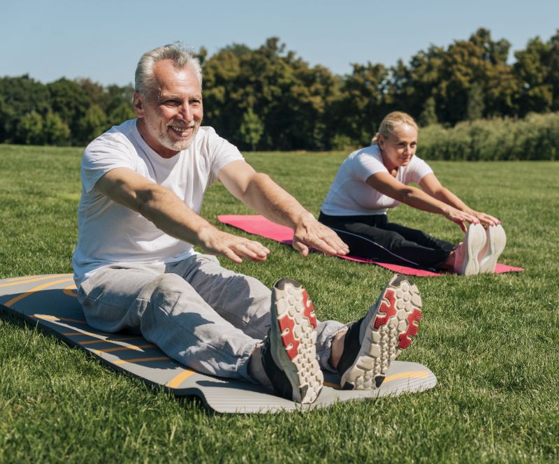 full-shot-old-people-stretching-together