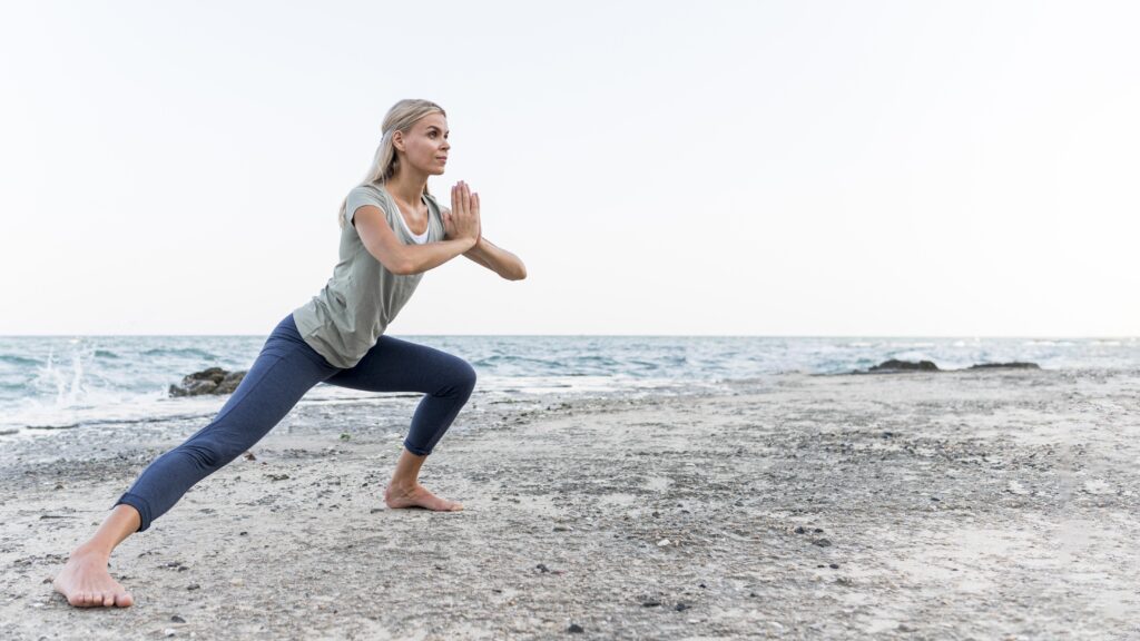 pretty-blonde-woman-practicing-yoga-outdoors (1)